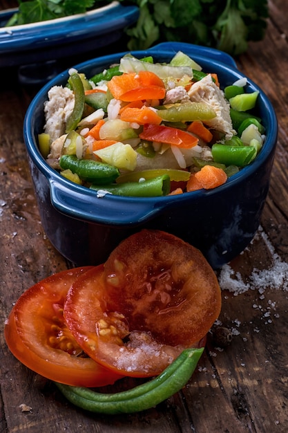 Vegetable stew cooked in a ceramic pot