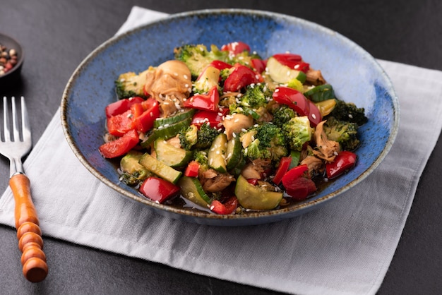 vegetable stir fried on blue plate