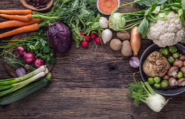 Vegetable. Top view assortment fresh vegetable on old oak table.