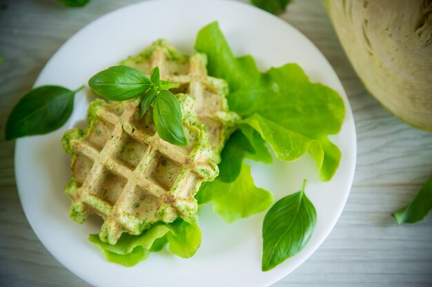 Vegetable waffles cooked with herbs in a plate