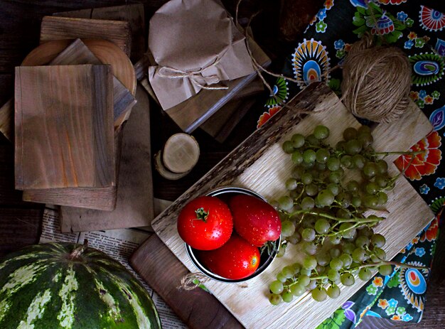 Vegetables autumn grapes rustic tomatoes