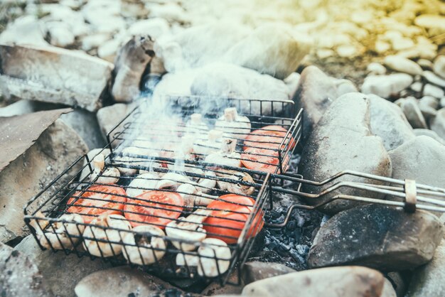 vegetables baking on camp fire resting outside hiking concept