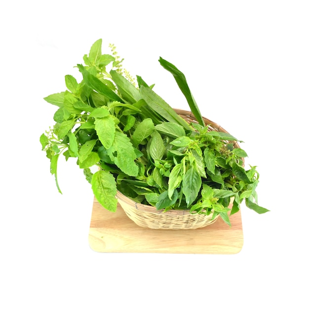 Vegetables in the basket, isolated on white