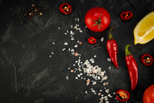 Vegetables on a black table top view