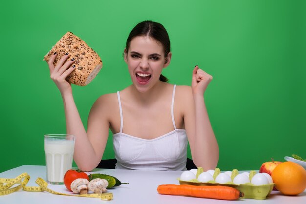 Vegetables diet funny woman eating healthy food dieting girl eating vegetable diet salad in studio v