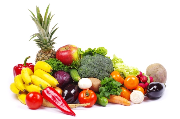 Vegetables and fruits on white