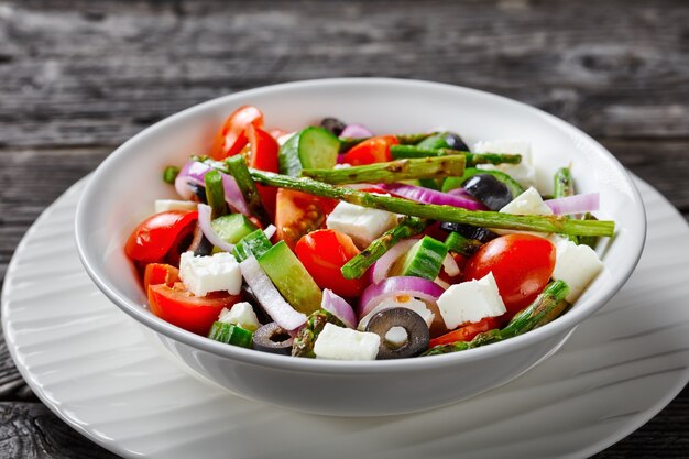 vegetables greek salad with grilled asparagus