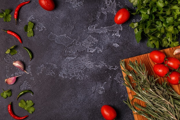 Photo vegetables, spices and herbs on a stone table