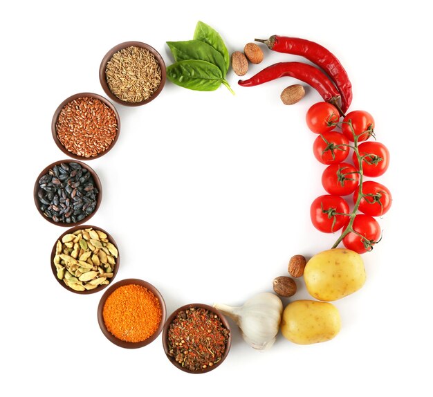 Vegetables and spices on white background