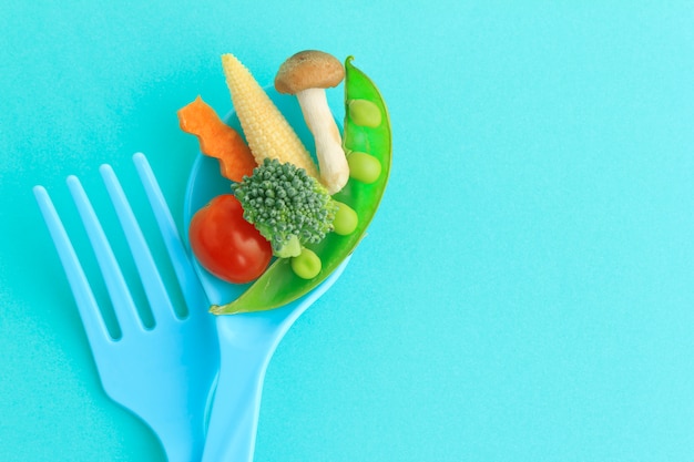 Vegetables with fork and spoon