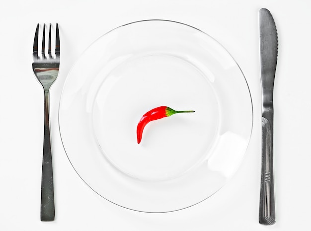 Vegetables with kitchen accessories on a white background