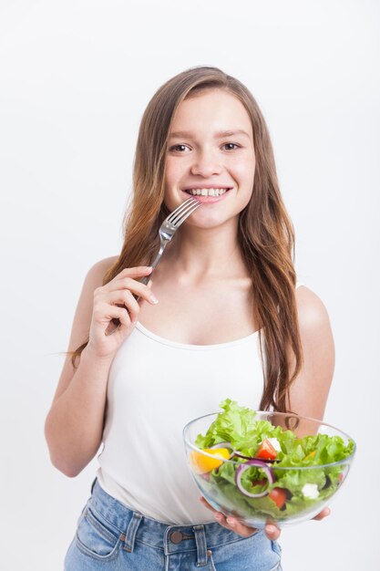 Vegetarian girl with salad