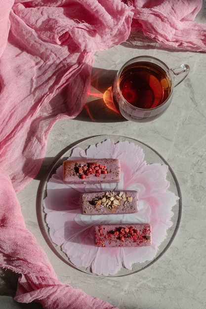 Vegetarian glazed cheese on pink background, dessert for vegan children