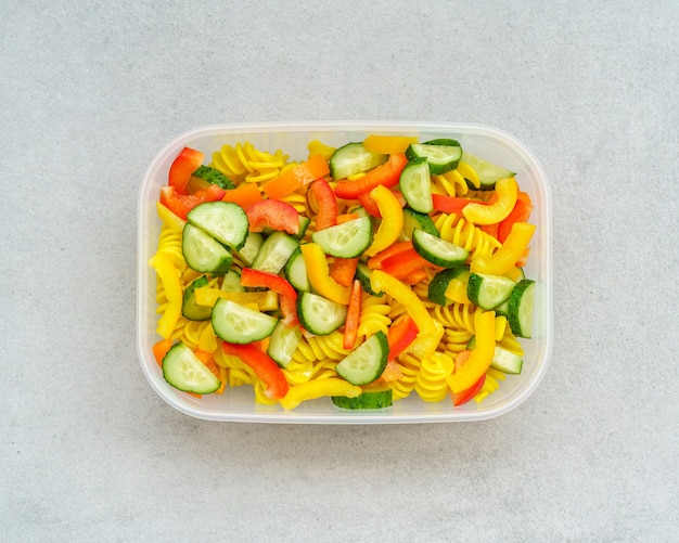 Vegetarian healthy cold pasta salad in lunch box