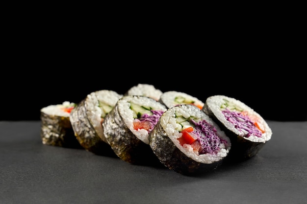 Vegetarian maki filled with vegetables.