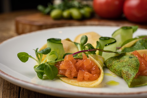 vegetarian pancakes on a plate on a wooden table