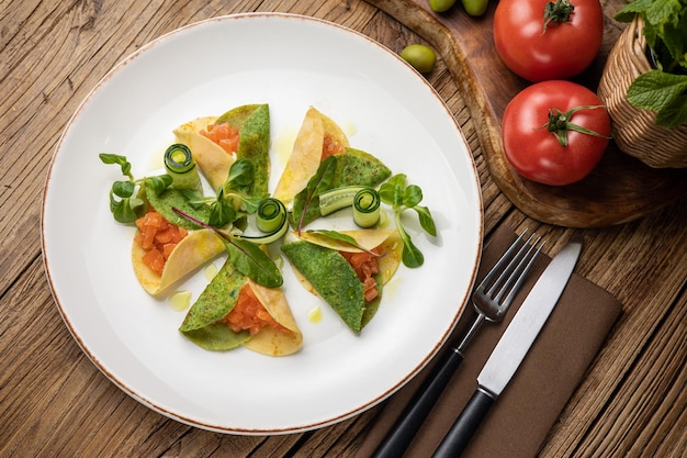 vegetarian pancakes on a plate on a wooden table