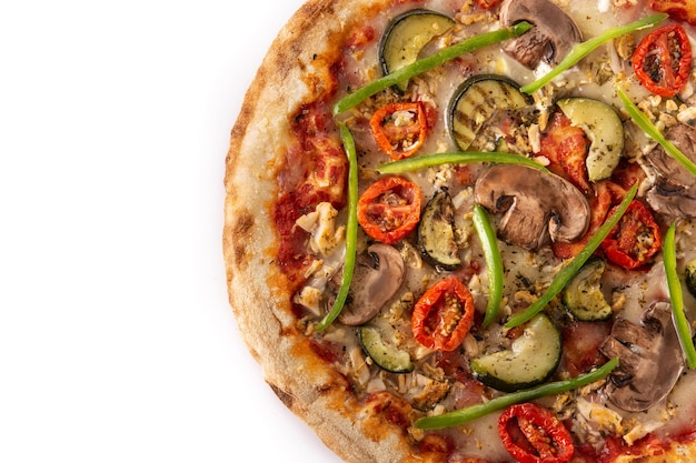 Vegetarian pizza with zucchini tomato peppers and mushrooms isolated on white background