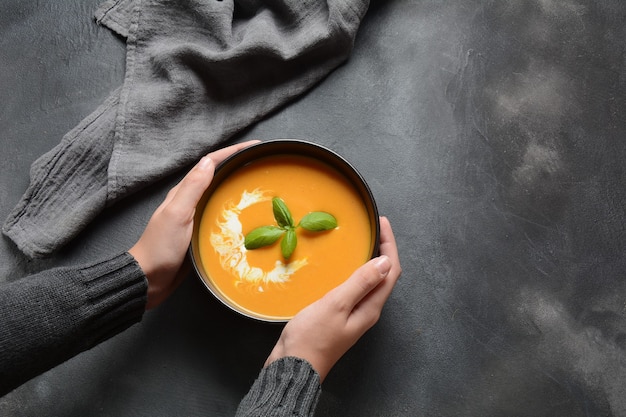 Vegetarian pumpkin cream soup in a bowl