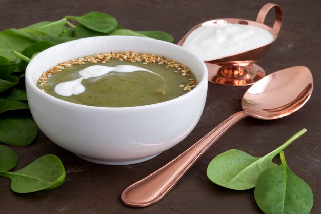 Vegetarian spinach soup in a white plate.