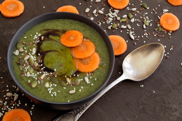 Vegetarian spinach soup with sesame seeds and flax.