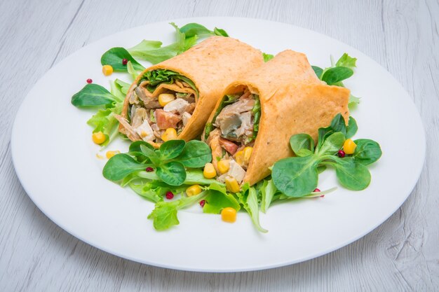 Vegetarian wrap with tofu and fresh vegetables