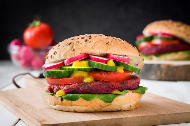 Veggie beet burger on white wooden table