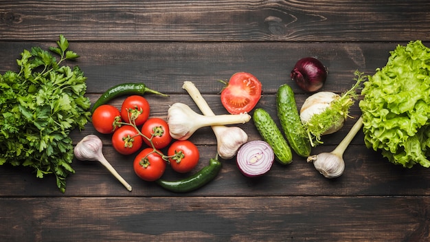 Veggies on wooden background