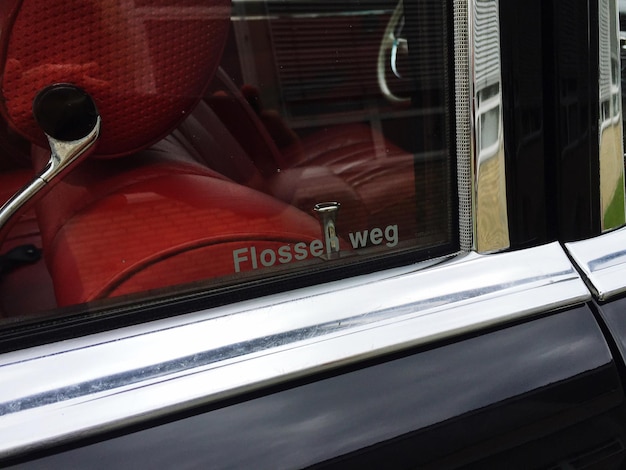 Photo vehicle seat seen through car window
