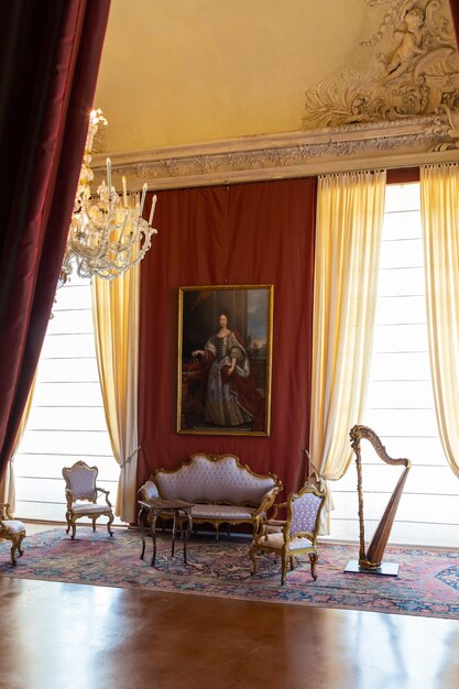 Venaria Reale Italy luxury interior old Royal Palace Perspective with harp window and baroque decoration