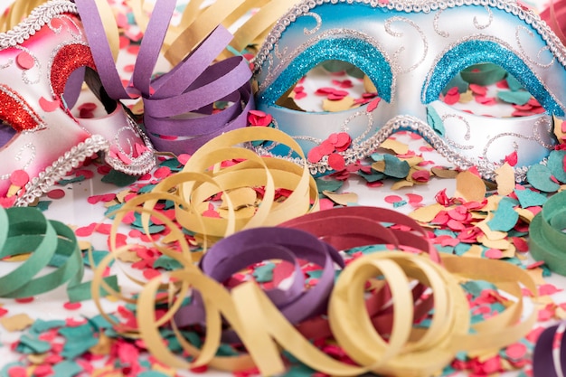 Venetian masks with confetti