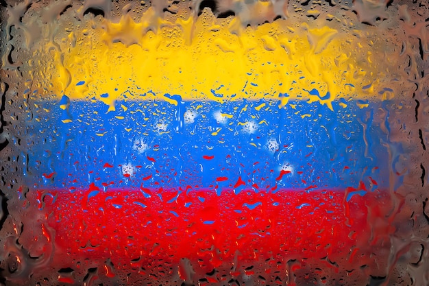 Venezuela flag Venezuela flag on the background of water drops Flag with raindrops Splashes on glass