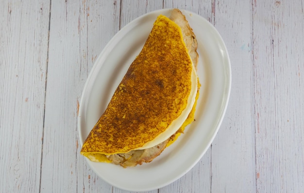 Venezuelan cachapa with cheese Top view