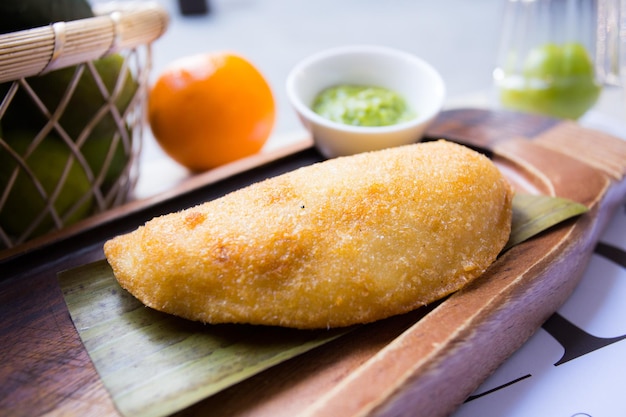 Venezuelan empanadas are made from precooked white or yellow cornmeal.