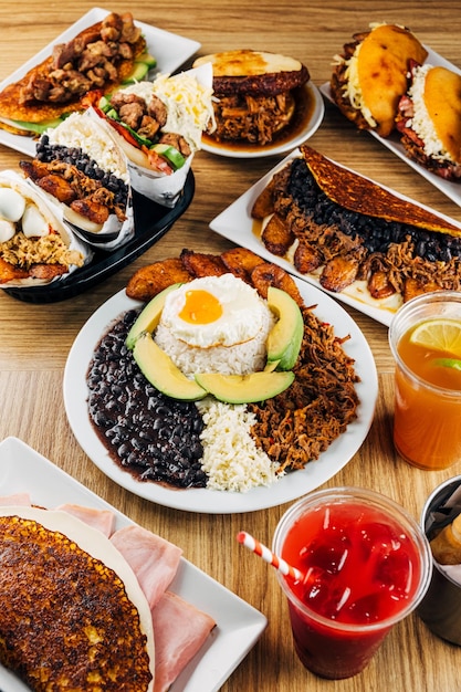 Venezuelan food on a table arepas tostones cachapas empanadas typical Venezuelan gastronomy