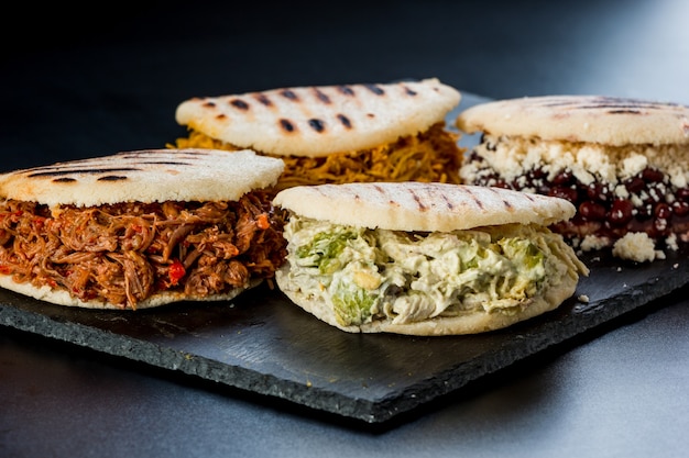 Venezuelan Latin American food 4 arepas of different stuffing