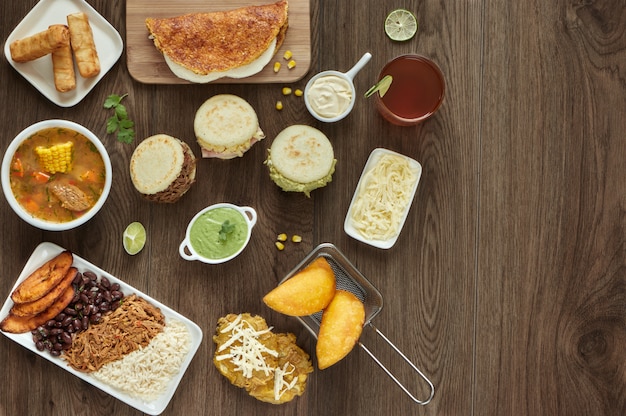 Venezuelan traditional food on a wooden table