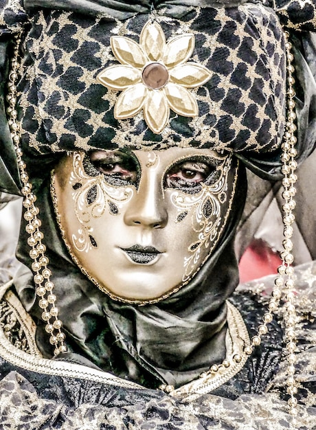 Venice carnival mask during carnival in venice italy