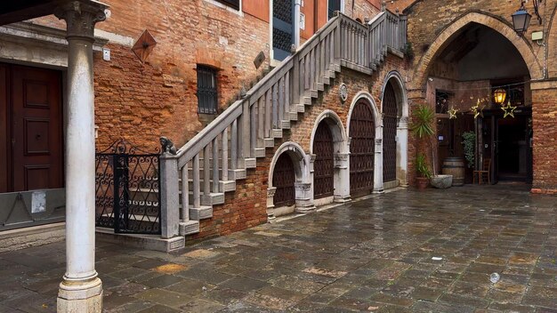 Venice Carnival People in Venetian carnival masks and costumes on streets of Venice Italy Europe February 10 2024