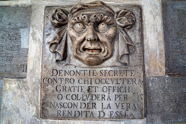 VENICE, ITALY - SEPTEMBER 13 2019 - Mouth Box for "Secret denunciations against those who hide favors and offices or collude to hide the true income of them" in Venice ancient whistleblowing system