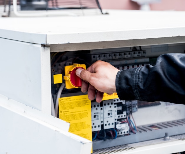 Ventilation cleaning. Specialist at work. Repair ventilation system (HVAC)