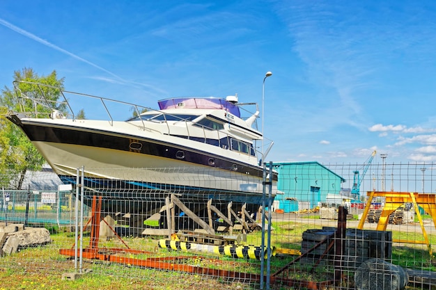 Ventspils, latvia - may 8, 2016: yacht in the street in ventspils of latvia. ventspils is a city in the courland region of latvia. latvia is one of the baltic countries