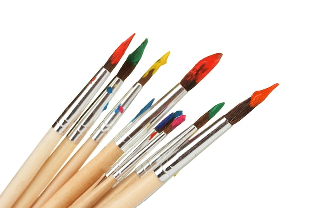Verf penseels met gouache geïsoleerd op wit