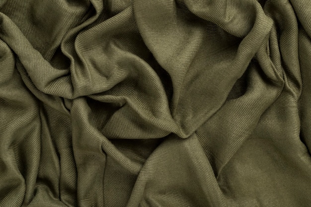 Verfrommeld linnen doek textuur. Gerimpeld textiel. Groen.