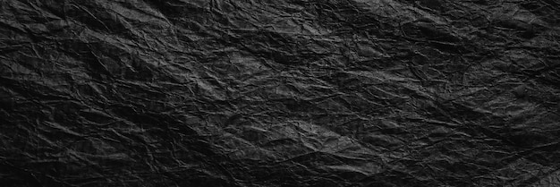 Verkrumpled zwart kraftpapier Verkrumpeld zwart gerecycled papier textuur Behangpapier voor webontwerp
