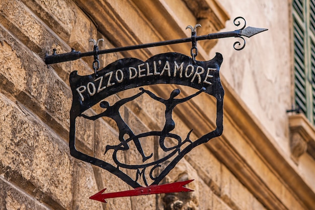 VERONA, ITALY 10 SEPTEMBER 2020: Old hand made sign in Verona