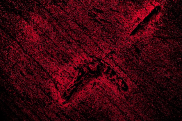 Verontruste rode grunge textuur op een donkere ondergrond
