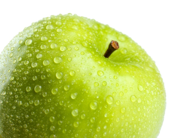 Verse groene appel geïsoleerd op wit