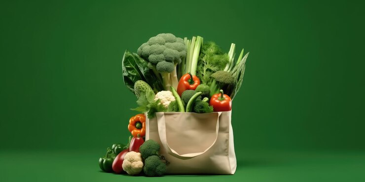 Verse groenten in een herbruikbare zak vegetarianisme gezond eten ecoproductenwinkel