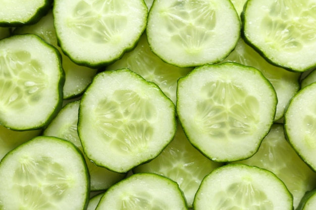 Foto verse komkommersnijden als achtergrond